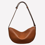 Brown leather ladies handbag is part of the Radley brand.