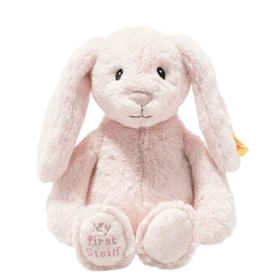 This Rose Pink My First Steiff Hoppie Rabbit measures at 26 cm tall.