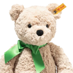 This Steiff Soft Cuddly Friends Jimmy Good Luck Teddy Bear has the stainless steel button in ear with the yellow Steiff label for branding.