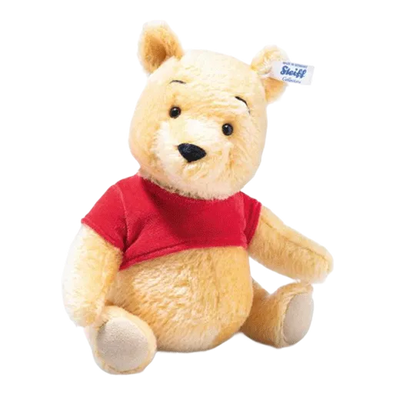 Steiff x Disney's Winnie The Pooh is made out of mohair and cotton with a brass "Button-in-Ear".
