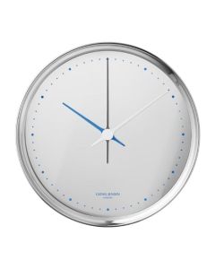 Georg Jensen's Koppel White Stainless Steel Wall Clock 22cm has blue detailing that stands out against the white.