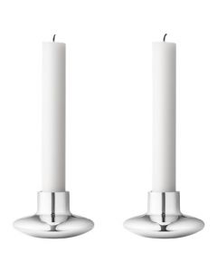 The Georg Jensen HK stainless steel candle holders.