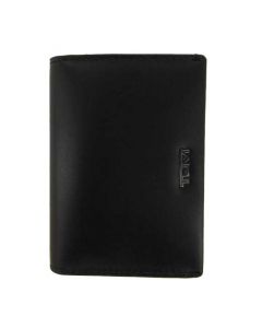 The TUMI branding can be seen on the front of this black leather card holder.