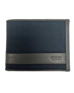 This TUMI navy wallet is made from a navy canvas material.