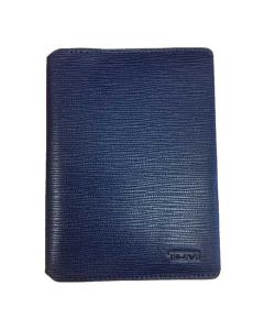 This TUMI leather passport holder comes with the brand name embossed into the leather. 
