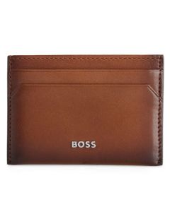 This BOSS Highway 4CC Brown Leather Card Holder has the brand name on the front in silver lettering.