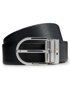 This BOSS Otif Reversible Italian Leather Belt with Signature Stripe Inlay is made out of Italian leather with one plain side in brown and the other in black saffiano.
