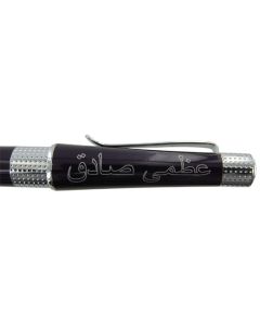 Engraving on the cap of this Cross pen in Arabic Script.