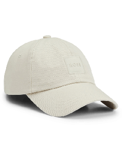 BOSS' Derrel Cotton-Twill Cap in Light Beige has an embroidered and rubberised logo on the front.