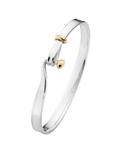 This is the Georg Jensen Sterling Silver & 18 KT. Yellow Gold Torun Bangle. 