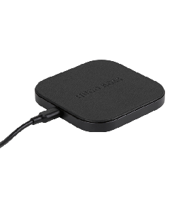 This Hugo Boss Iconic Black Wireless Charger has the brand name embossed on the surface. 