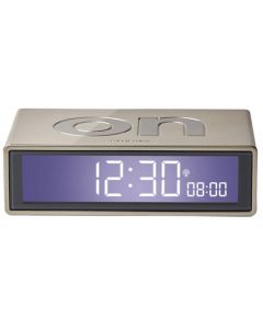 This Flip+ Travel Gold Alarm Clock has been designed by Lexon. 