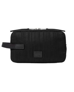 This Black Shadow Stripe Wash Bag by Paul Smith has a striped exterior with a black metal plaque on the front with the signature name.