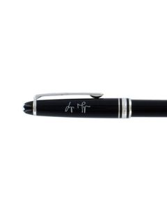 Signature engraving on the cap of a Montblanc ballpoint pen.