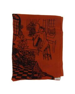 This Paul Smith orange scarf comes  with a villa pattern on it.