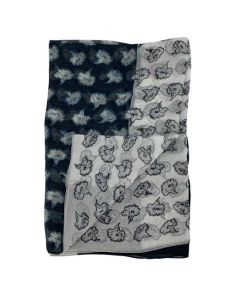 This Paul Smith scarf is made from a silk material in a floral black and white pattern.