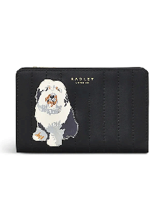 Radley And Friends Black Leather Quilted Purse, Medium has stitching going vertically to add texture.