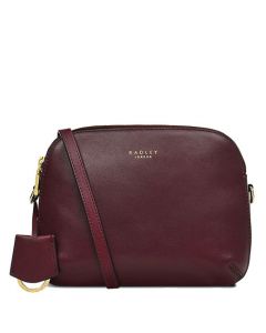 This Dark Red Dukes Place Medium Cross Body Bag was designed by Radley. 