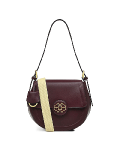 Radley's Saddle Street Flapover Dark Red Cross Body Bag has the Heirloom Scottie Dog emblem on the front in gold hardware. 