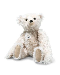 This Steiff Replica 1904 RMS White Teddy Bear is made out of a mohair and cotton blend, stuffed with wood shavings.