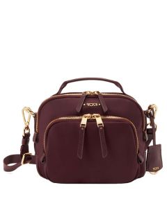 This Voyageur Purple Troy Cross Body Bag was designed by TUMI. 