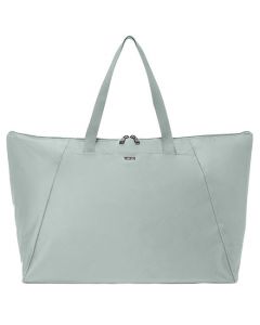 This Voyageur Mist Green Just In Case Tote Bag is designed by TUMI. 