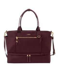 This Voyageur Purple Cleary Weekender Bag was designed by TUMI. 