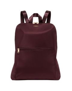 This Voyageur Beetroot Just in Case Backpack was designed by TUMI. 