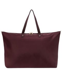 This Voyageur Purple Just in Case Tote Bag was designed by TUMI. 