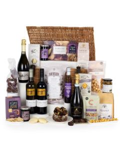 The Ultimate Hamper by Wheelers Luxury Hampers with a range of sweet treats, savoury and bottles of bubbly.