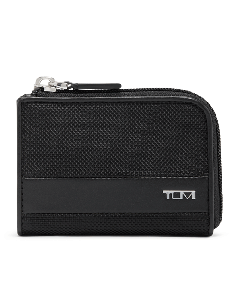 TUMI's Alpha Black Zip Around Card Case has the brand name in silver lettering on the front.